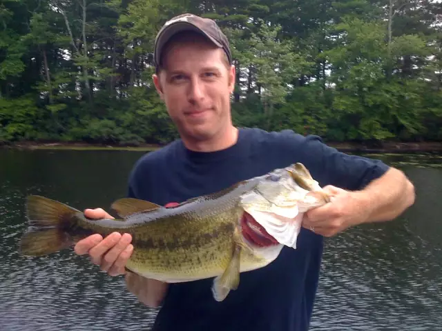 5.8 lbs largemouth bass with white popper frog