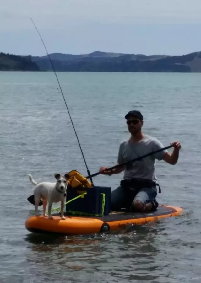 My dog loves paddle board fishing too