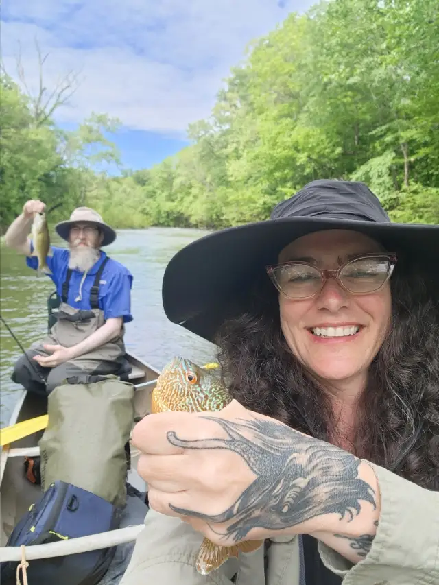 Bass and long ear in the river